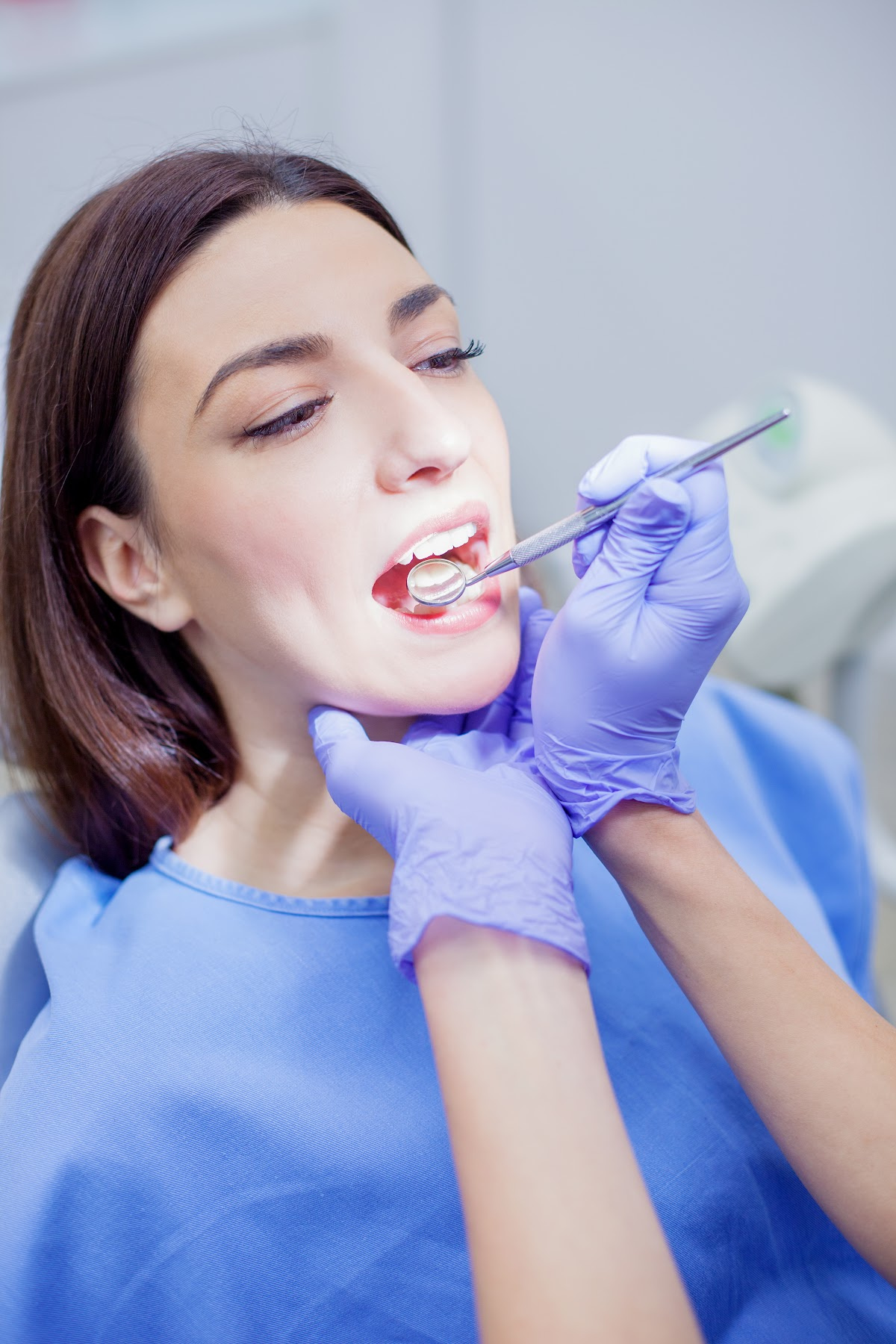 woman at dentist in dental office dental emergency